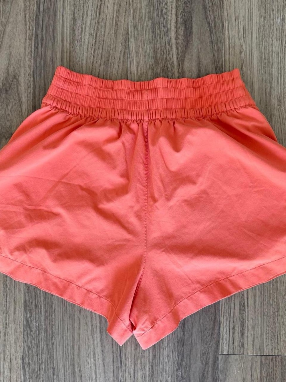 Athleta Orange High-Rise Running Shorts